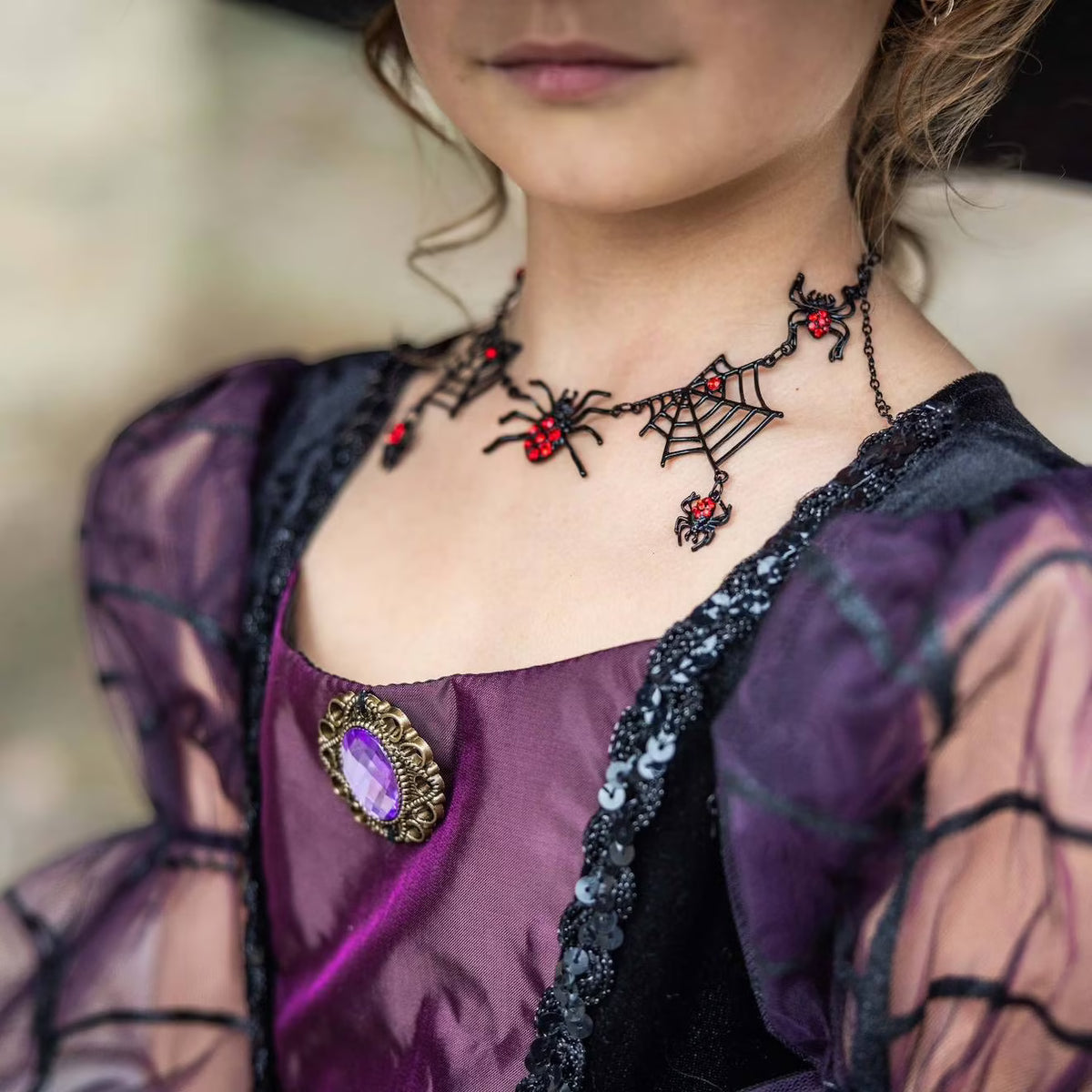 Collier araignées avec strass rouges